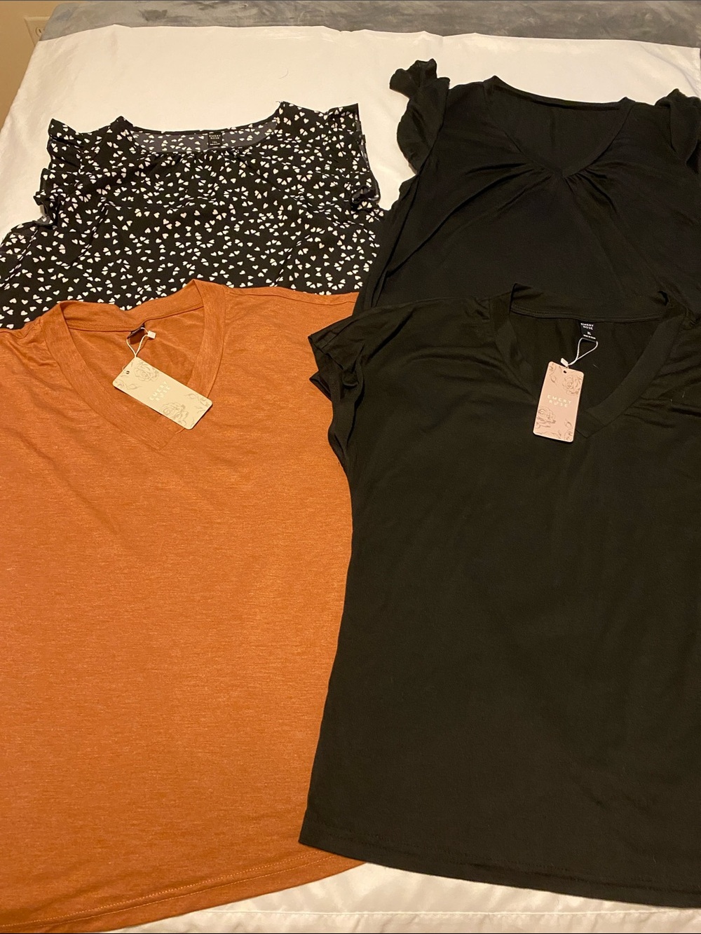 4 Emery Rose short sleeve tops; 2 XL and 2 are 1XL NWT